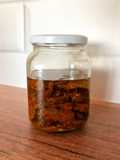 Tomates secos en aceite de oliva y especias (tomates deshidratados)