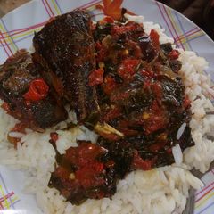 A picture of White rice with vegetable stew.