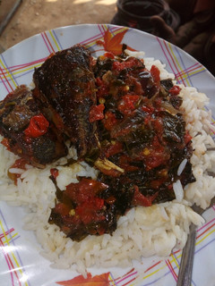 A picture of White rice with vegetable stew.