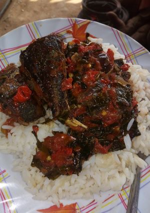 A picture of White rice with vegetable stew.