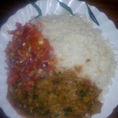 A picture of Rice kachumbari with beef stew.