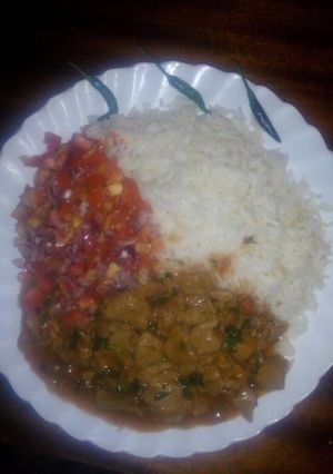 A picture of Rice kachumbari with beef stew.