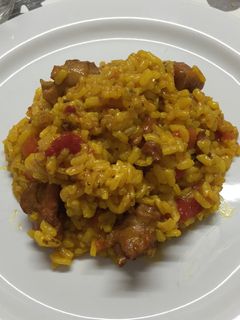 Una foto de Arroz con conejo