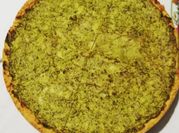 Una foto di torta salata con broccoletti