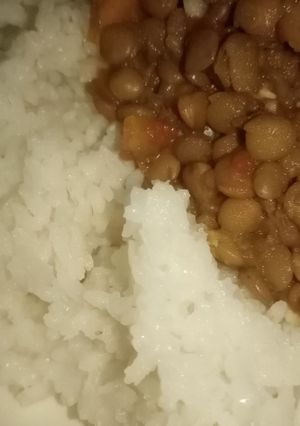 A picture of Coconut rice and kamande(lentils).