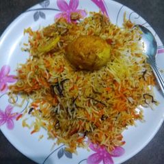 A picture of Spicy egg pulao.