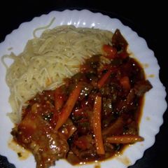 A picture of Spaghetti with stew.