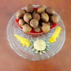 A picture of Gulgula(indian sweet donut).