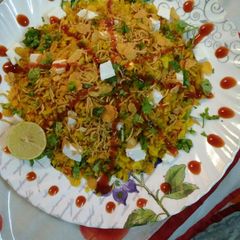 A picture of Cheese cornflakes veggie poha.