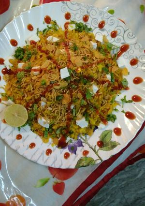 A picture of Cheese cornflakes veggie poha.