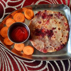 A picture of Beetroot,potato,corn paratha.