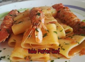 Foto di Calamarata con Cicale di Mare e Pelati