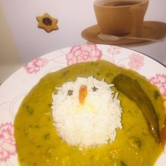 A picture of Chane ki dal gosht with rice.