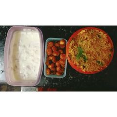 A picture of Cabbage Rice with Baby corn Fry tasty lunch box.
