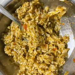 A picture of Tomato paneer rice.