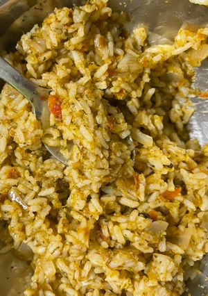 A picture of Tomato paneer rice.