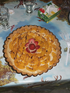 Una foto de Tarta de durazno y crema pastelera