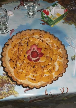 Una foto de Tarta de durazno y crema pastelera