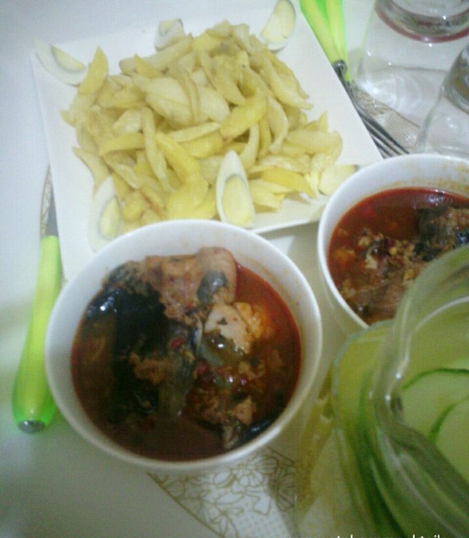 A picture of Chips, catfish pepper soup and cucumber cooler.