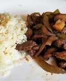 Lomo con apio y champignones