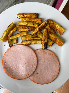 Una foto de Bastones de calabacín especiados en airfryer