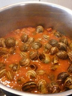 Una foto de Caracoles con tomate