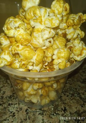 Une photo de Pop Corn 🍿🍿 à la sauce caramel