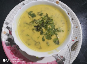 A picture of UP style Dahi wali Arbi Spicy Arbi in yogurt curry.