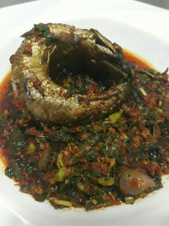 A picture of Vegetable sauce with smoked fish.