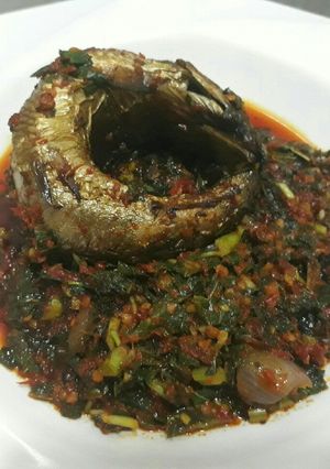 A picture of Vegetable sauce with smoked fish.