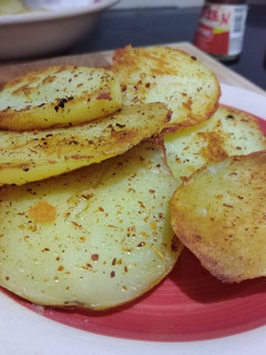 Una foto de Papas salteadas al merkén