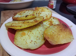 Una foto de Papas salteadas al merkén