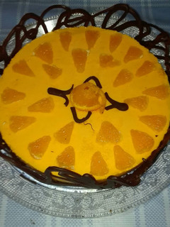 Una foto de Tarta de mousse de mandarina