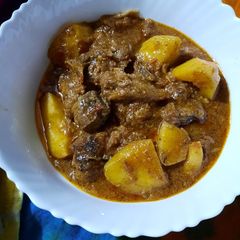 A picture of Alu gosht.