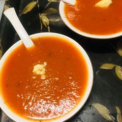 A picture of Tomato and carrots soup.