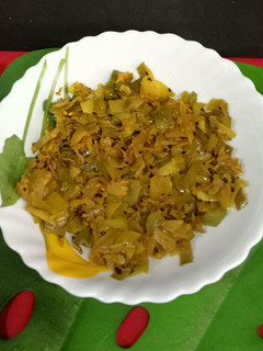 A picture of Aloo Potoler Khosar(peels) chorchori.