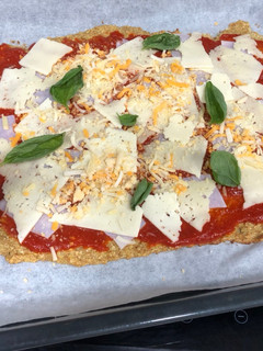 Una foto de Pizza con base de coliflor