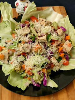 A picture of Masala Paneer with Salad.