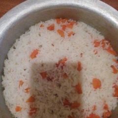 A picture of Boiled Rice with carrots.