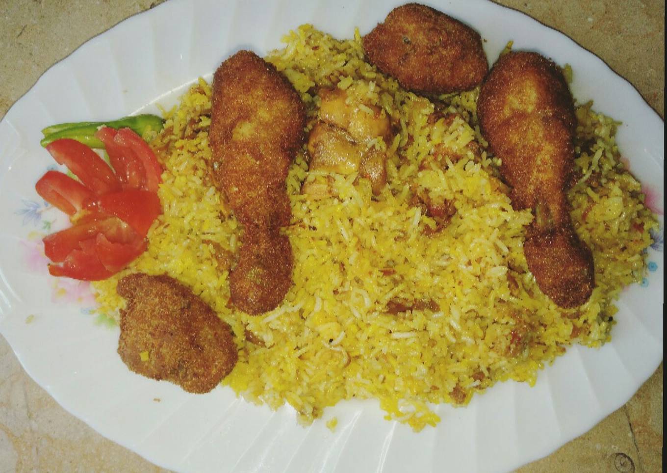 Chicken Tikka biryani & crispy chicken pieces