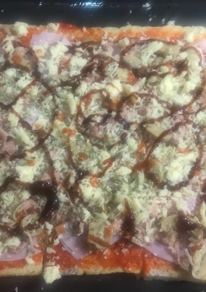 Una foto de Pizza con pan de molde sin corteza