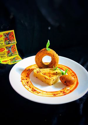 A picture of Masala magic savoury falafel doughnut with masala magic garlic hummus.