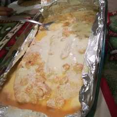 Una foto de Salmón parmesano