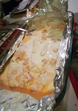 Una foto de Salmón parmesano
