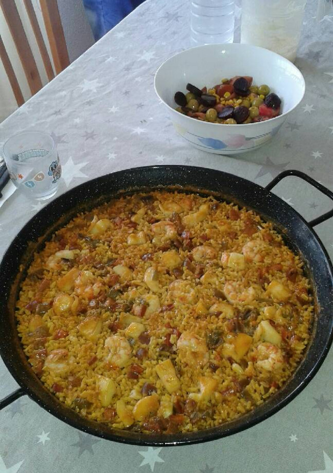 Una foto de Arroz a banda