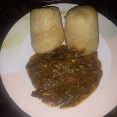 A picture of Alkubus with vegetable soup.