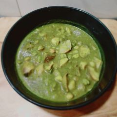 A picture of Singhada and green chana curry.