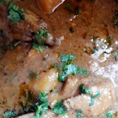 A picture of Aloo Chicken curry.