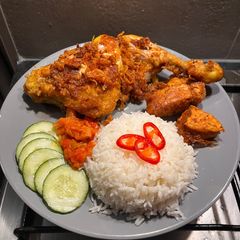 A picture of Ayam penyet (Indonesian Fried Chicken).
