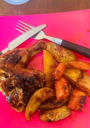 A picture of Grilled Chicken with Potatoes and Carrots.